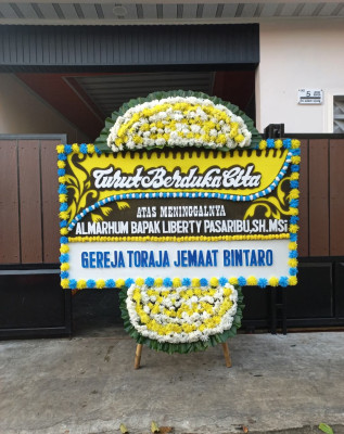 Papan Bunga Duka di Wenang Utara